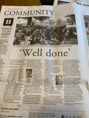 Photo of the newspaper with the headline 'well done'