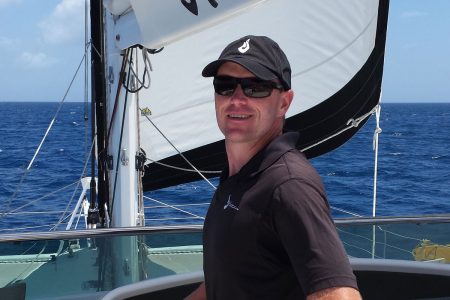 Ryan Beckman '99 on a sailboat