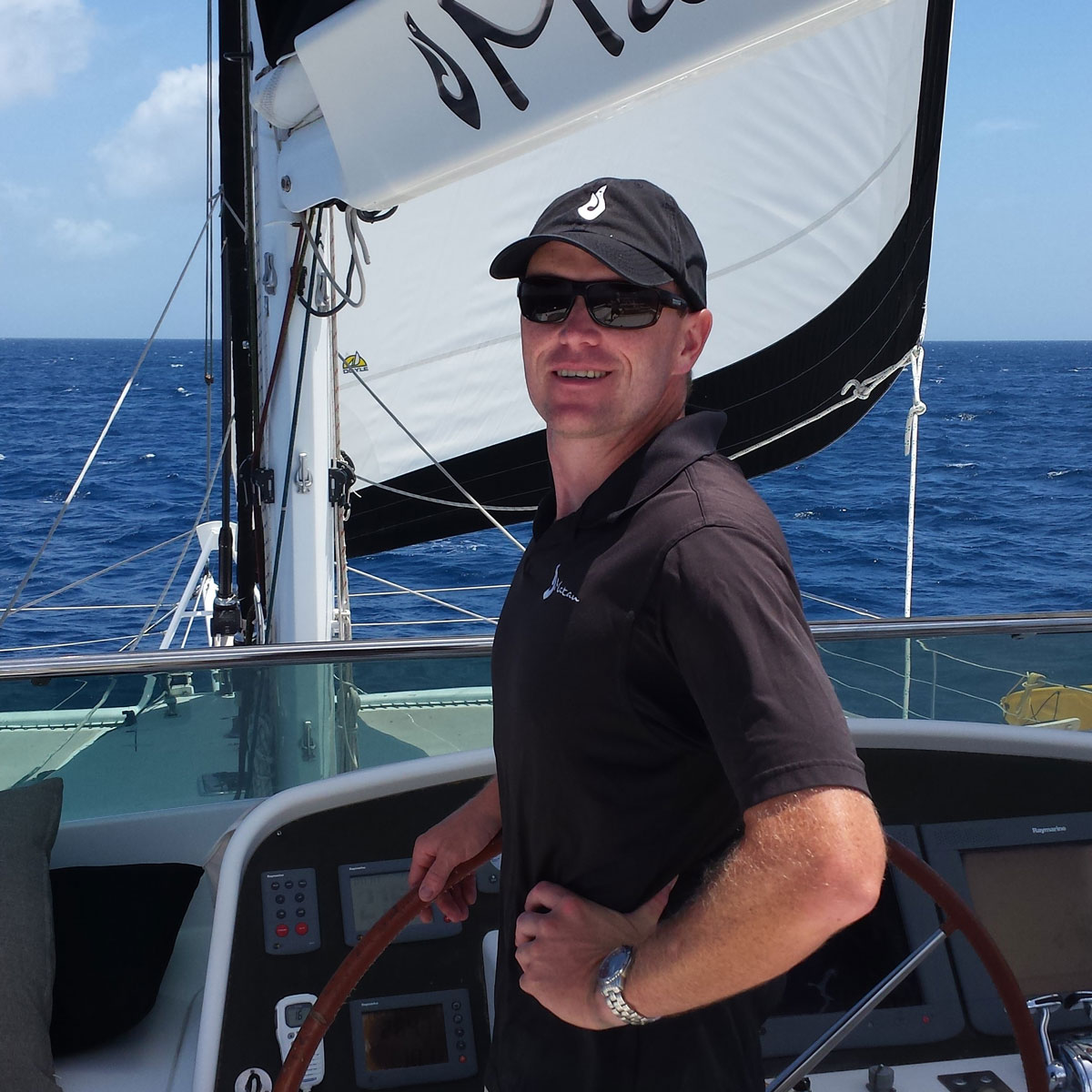 Ryan Beckman '99 on a sailboat