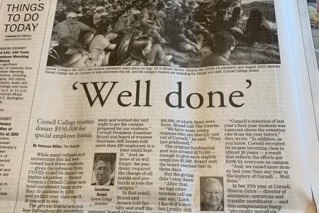 Photo of the newspaper with the headline "Well done"