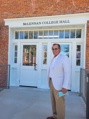 Dick Chambers ’65 in front of McLennan College Hall