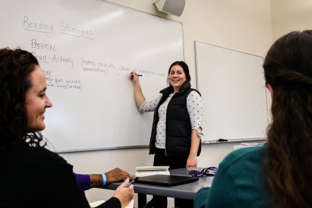 Coordinator of First-Year Experience and Parent Communication Madison Dockter works with Student Success Team during their staff meeting.