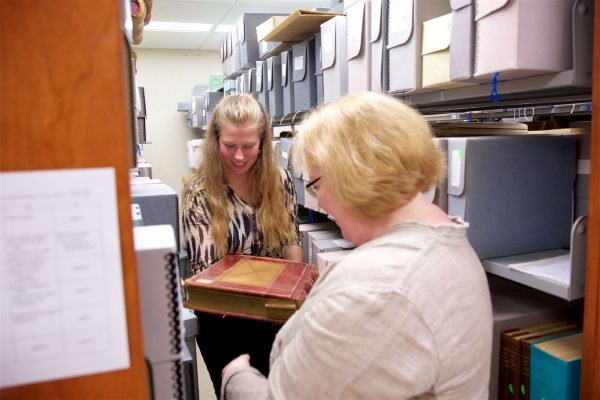 Hannah Robertson '18 works with Professor Catherine Stewart in the Cornell Archives during CSRI 2016.