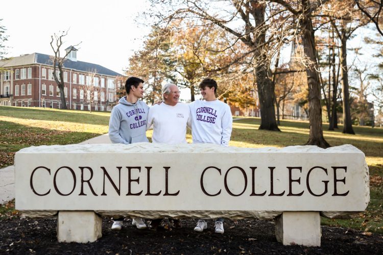 Brothers Jack Bickel ’24 (left) and Will Bickel ’25 (right) with their grandfather John “Corky” Bickel ’66 on campus.