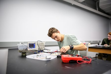 student working on an engineering project