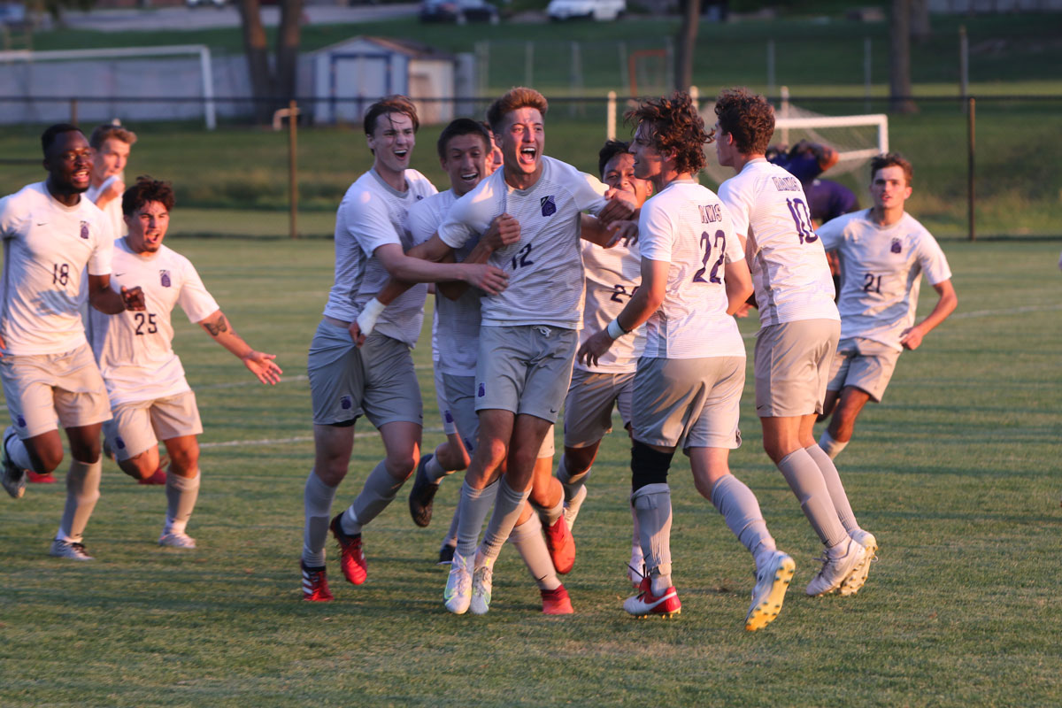 Soccer player Galen Westervelt ’23 (center, #12) and his Cornell teammates celebrate a 1-0 overtime win over Rockford University last fall. The 15-4 Rams set a school record for most wins in a season, tied for first place in the Midwest Conference, and reached the championship match of the MWC Tournament for the first time since 1982. 