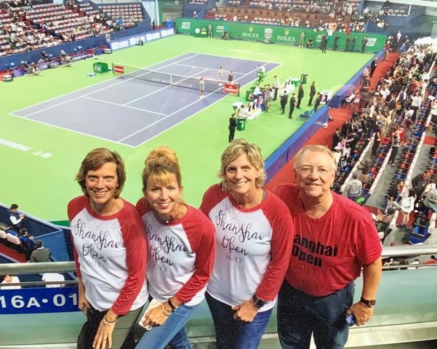 Cheryl Peterson Vande Voorde ’87, Mary Claire Kemp Kenworthy ’86, and Christine Johnson Veitzer ’89 (from left) traveled with their Rams tennis coach Fred Burke ’70 to see the Shanghai Open in 2018.