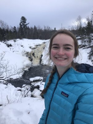 Lily Heinzel with snow in the background