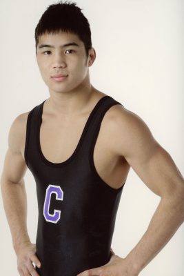 Chris Heilman '08 as a Cornell College student-athlete - standing in his wrestling singlet