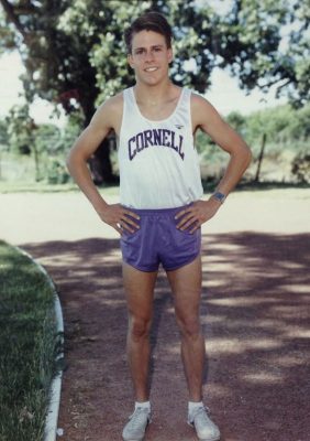 All-American Jeff Maples '89 standing in front of a tree in his uniform as a Cornell College student-athlete.