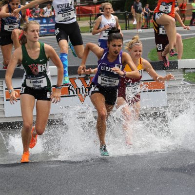 All-American Sanjuanita “Sam” Martinez ’16 runs a course as a student-athlete.