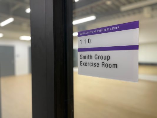 Sign that says "Smith Group Exercise Room"