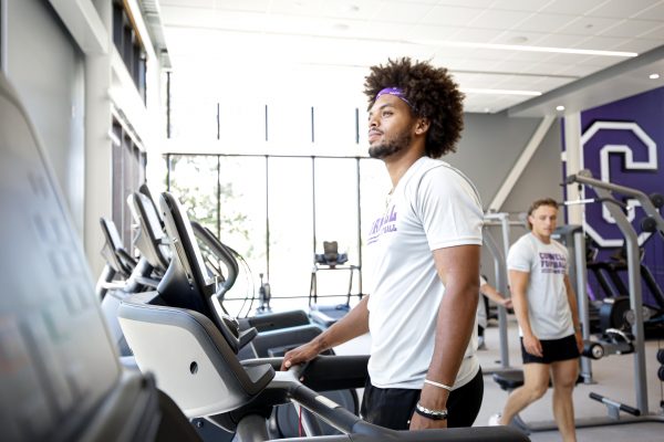 Student exercising on a treadmill