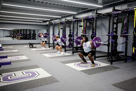 Students using weights in the SAW