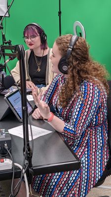 Students work on the podcast “Exposing Your High School Reading List” in the Academic Technology Studio.