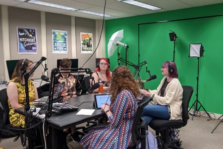 Students work on the podcast “Exposing Your High School Reading List” in the Academic Technology Studio.