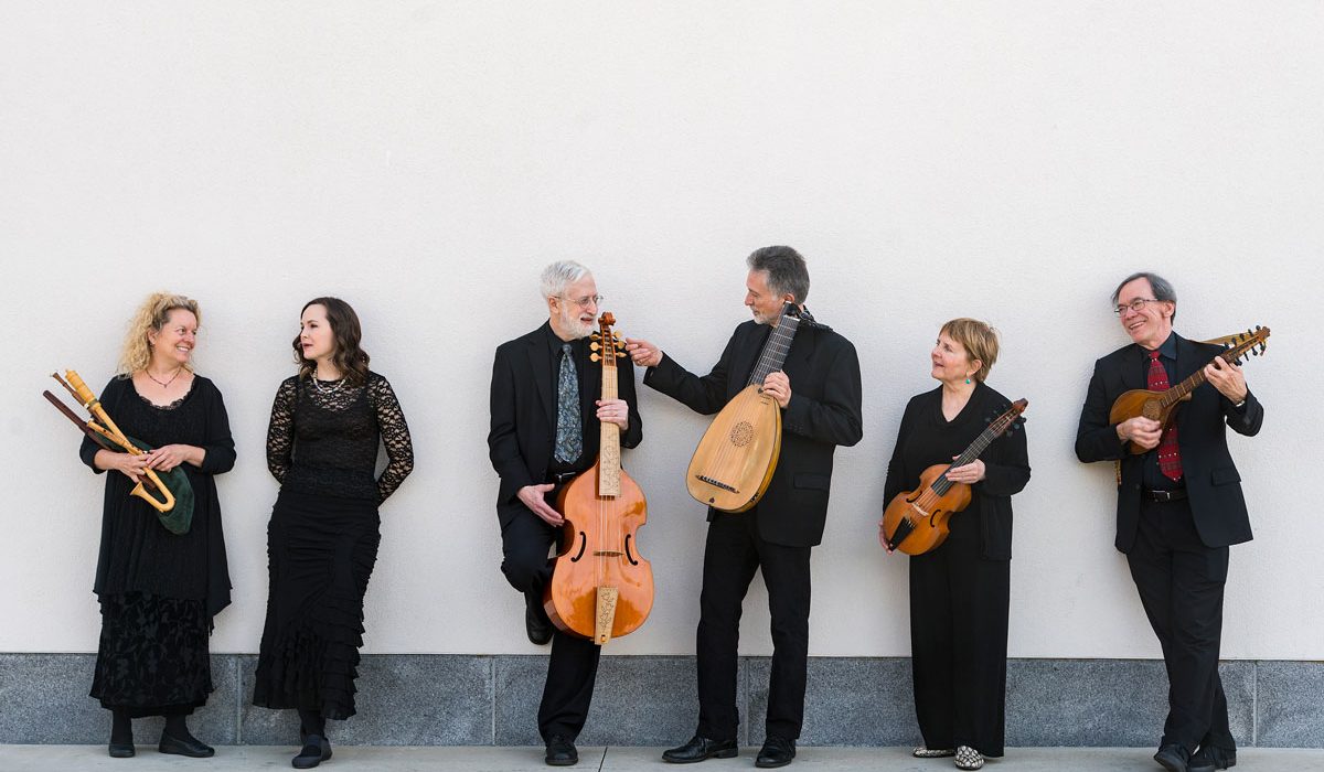 six members of the Baltimore Consort stand together with their instruments