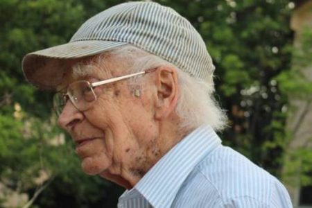 profile headshot of George Duffy '42 wearing a cap