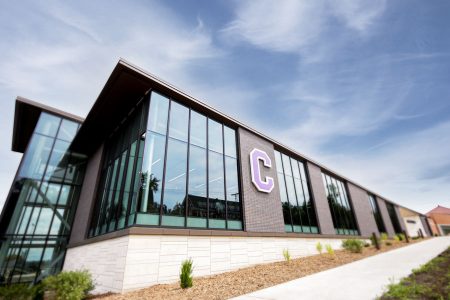 Exterior photo of the SAW showing the Cornell "C" and windows.