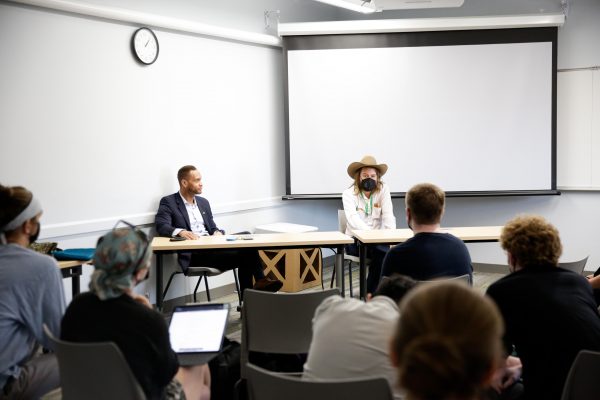 Linn County Supervisor Stacey Walker and Johnson County Supervisor Jon Green talk with students taking the Second-Year Seminar: Bottom-up Democracy: Organizing in State and Local Politics.