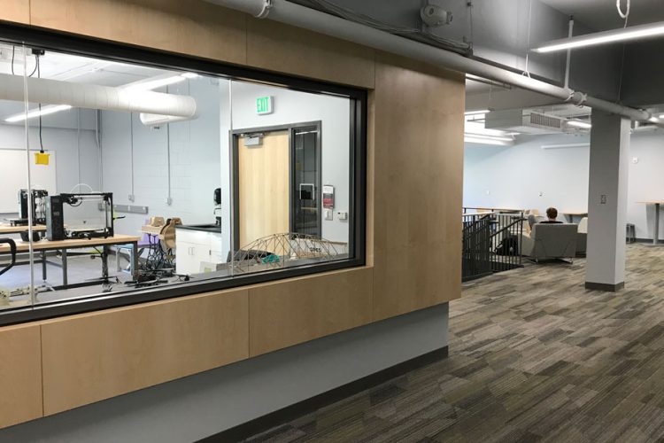 View into the West Science Fabrication Lab with the lobby visible on the right