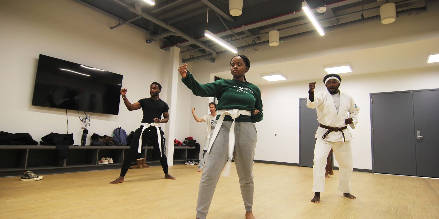 Associate Professor of Kinesiology Lewis Kanyiba teaches Martial Arts for Fitness.