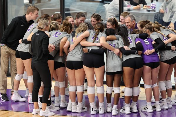 Volleyball huddle during a game