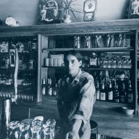 Jim Ellison stands behind the bar of the General Tavern