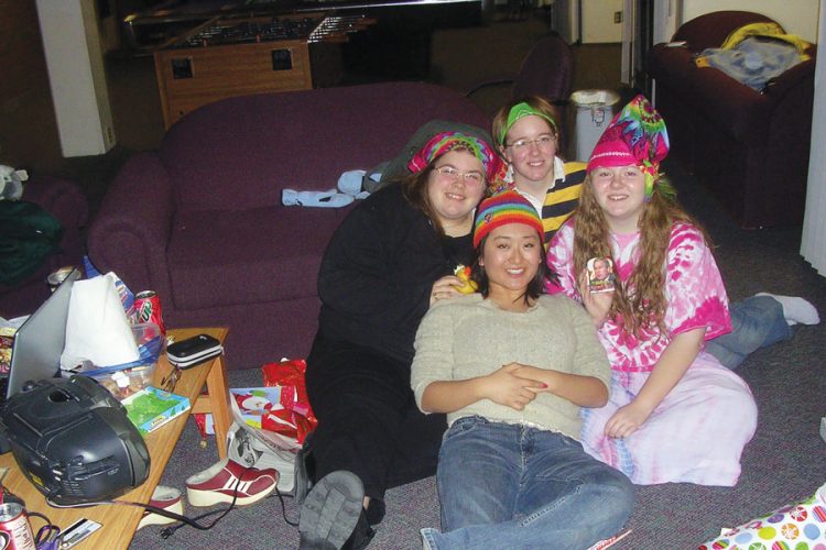 Pauley Lounge Folk during their annual Christmas celebration: Shawna Anderson ’09 (front), Erin Casey ’09, Autumn Allen ’09, and Desiree Clark ’09 (back, left to right).