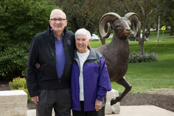 Richard and Norma in 2018 with the Ram statue, then a new feature in front of the Richard and Norma Small Athletic and Wellness Center.