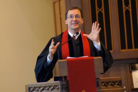 Rev. Burns Stanfield preaching