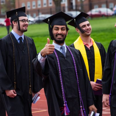 Members of the Class of 2022 line up for Commencement. Photo by Allan Recalde. 