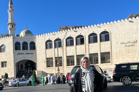 Athraa Mhanna ’25 stands in front of King Abdullah I Mosque during her Cornell Fellowship in Amman, Jordan. Photo courtesy Athraa Mhanna ’25