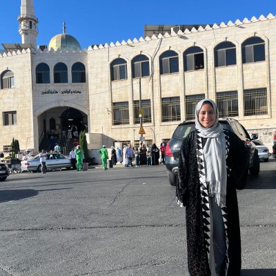 Athraa Mhanna ’25 stands in front of King Abdullah I Mosque during her Cornell Fellowship in Amman, Jordan. Photo courtesy Athraa Mhanna ’25.