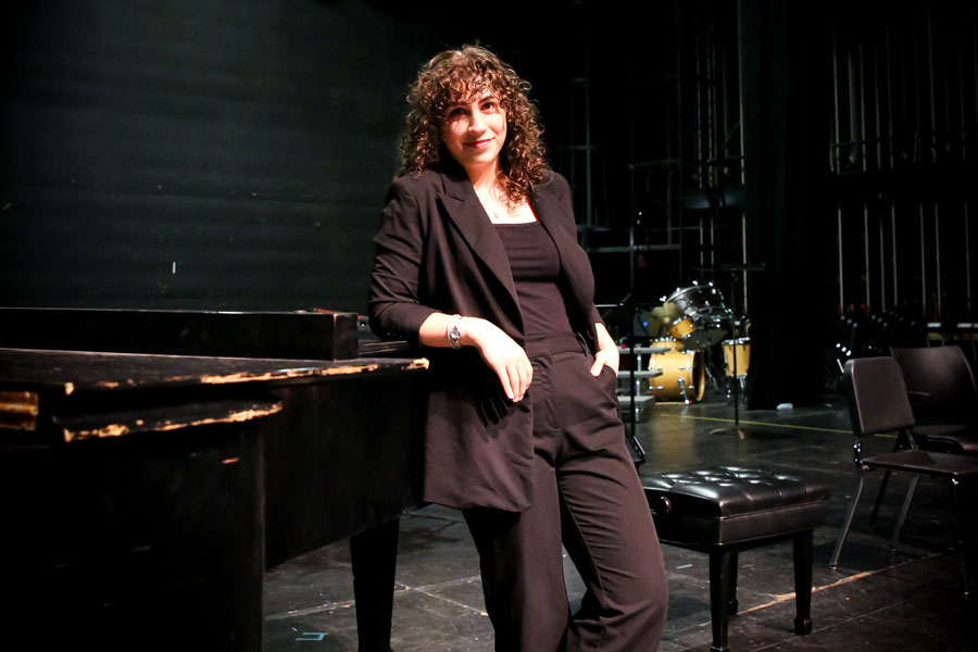 Emily Martyka ’24 often wears concert black for her job as the music work-study student manager, allowing her to fill any roles that come up during a performance. Photo by Megan Amr.