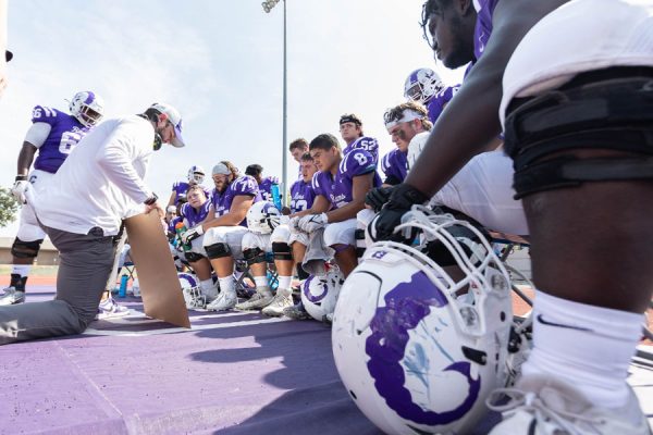 The Rams football team on gameday. They welcomed three members of the U.S. Navy SEALs to campus for two long days of drills, focusing on their mental performance game. Photo by Ray Borchert ’24.