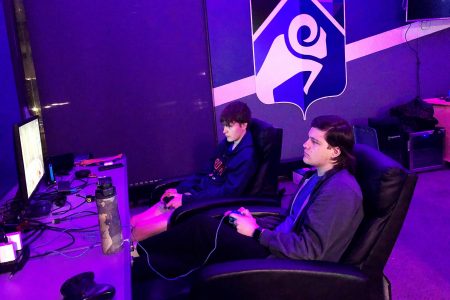 Camden Bergquist (right) and Arjay Jacobs play a practice set in the Cornell Esports Arena.