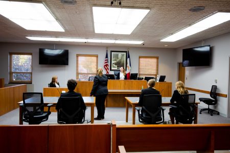 Students participating in Mock Trial in a Iowa courtroom.