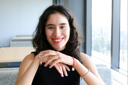 Posse Scholar Claudia Collazo-Ramos ’27 smiles at the camera.