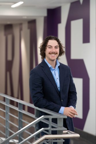 Jack Langan ’24 stands in the Richard and Norma Small Athletic and Wellness Center.