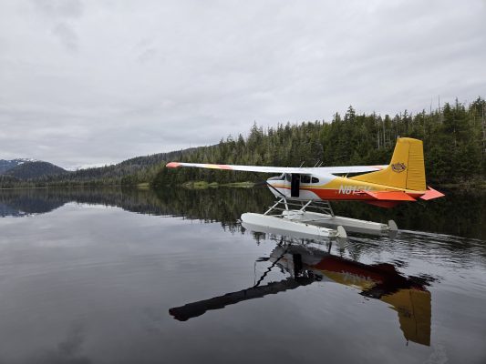 a float plane sitting on water.