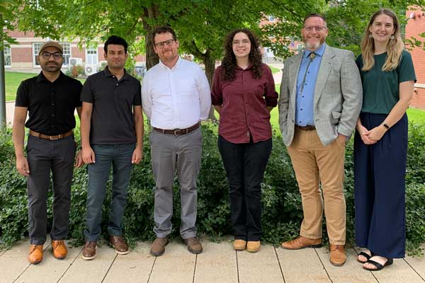 New Cornell faculty, from left: Harmeet Singh Bhoday (chemistry), Mazhar Iqbal (physics), Sam Walker (English), Stevie Haley Delgado (art), Scott Russell Morris (English), and Krista Robbins (psychology).