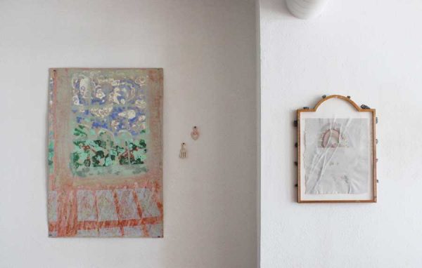 two artworks on a wall