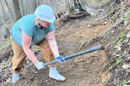 Audrey Pagel ’24, co-coordinator of Alternative Spring Break, completes a small section of the Cumberland Trail.