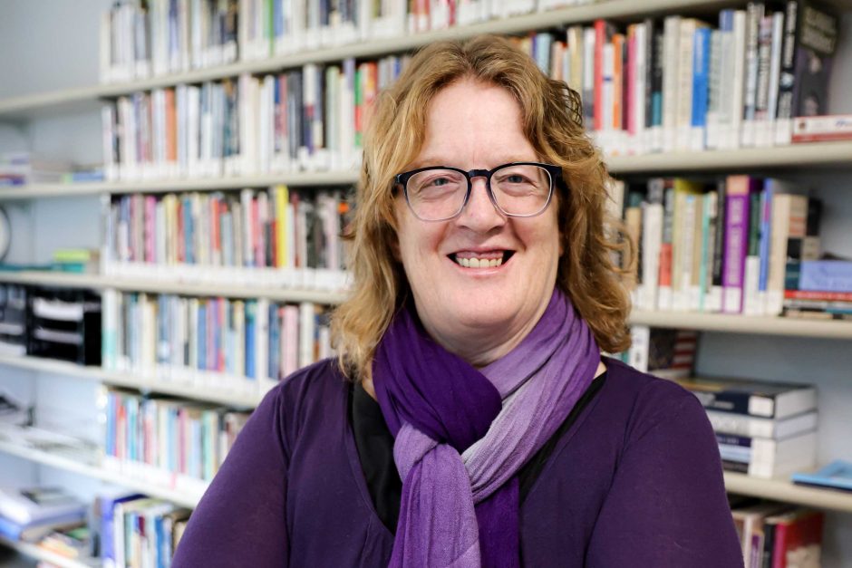 Professor of Sociology Erin Davis in her book-lined McLennan College office.