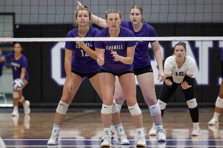 Hillyard prepares for a serve in the front row during a home match last season.