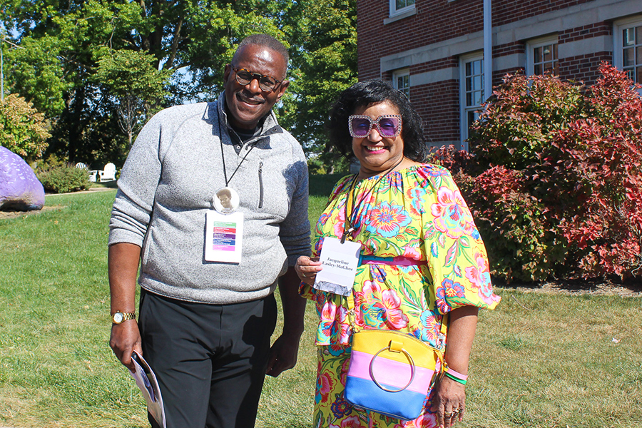 Odell McGhee ’74 and Jacqueline Easley-McGhee stop near The Rock and Law Hall.